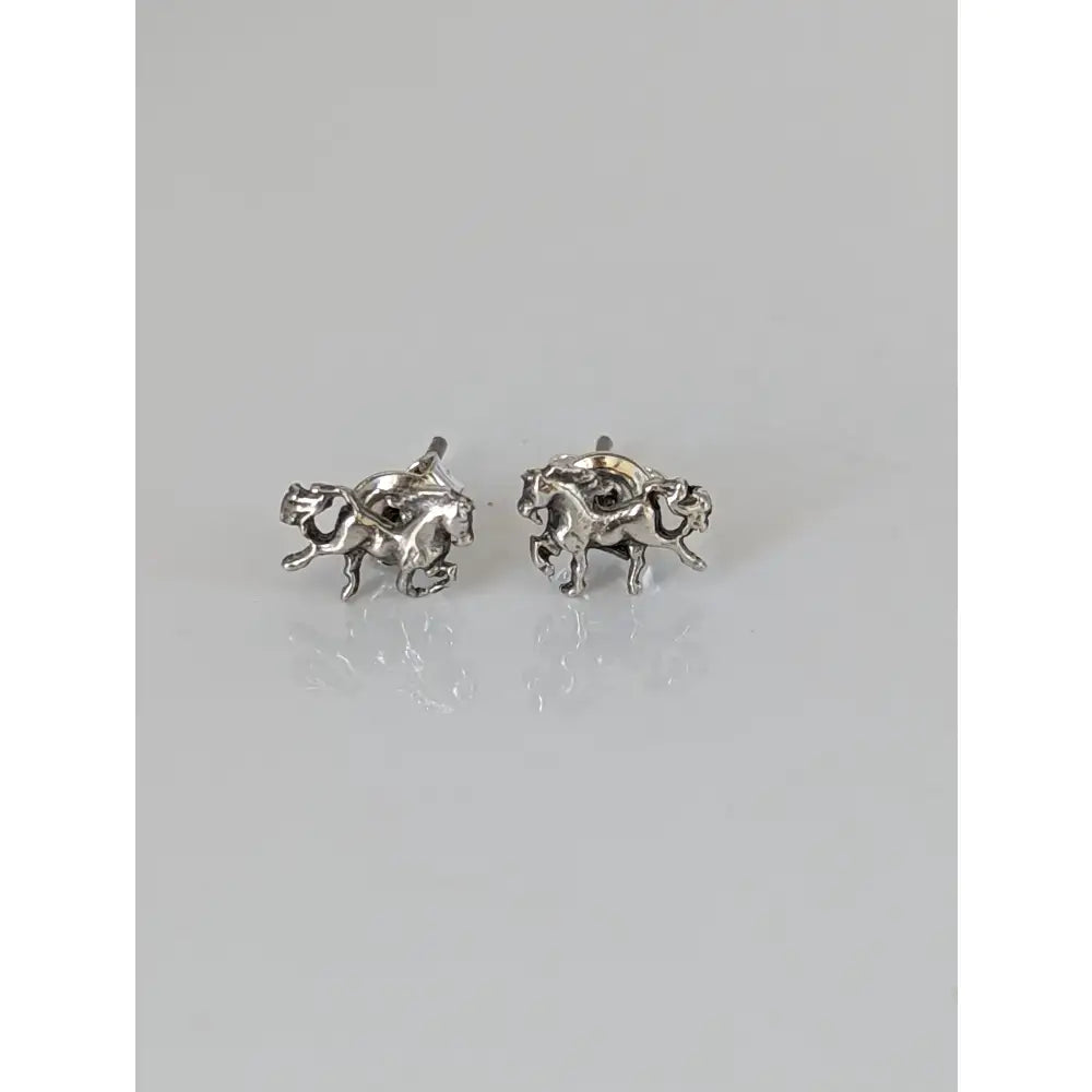 Silver galloping horse stud earrings with intricate handmade equestrian design in polished 925 silver finish