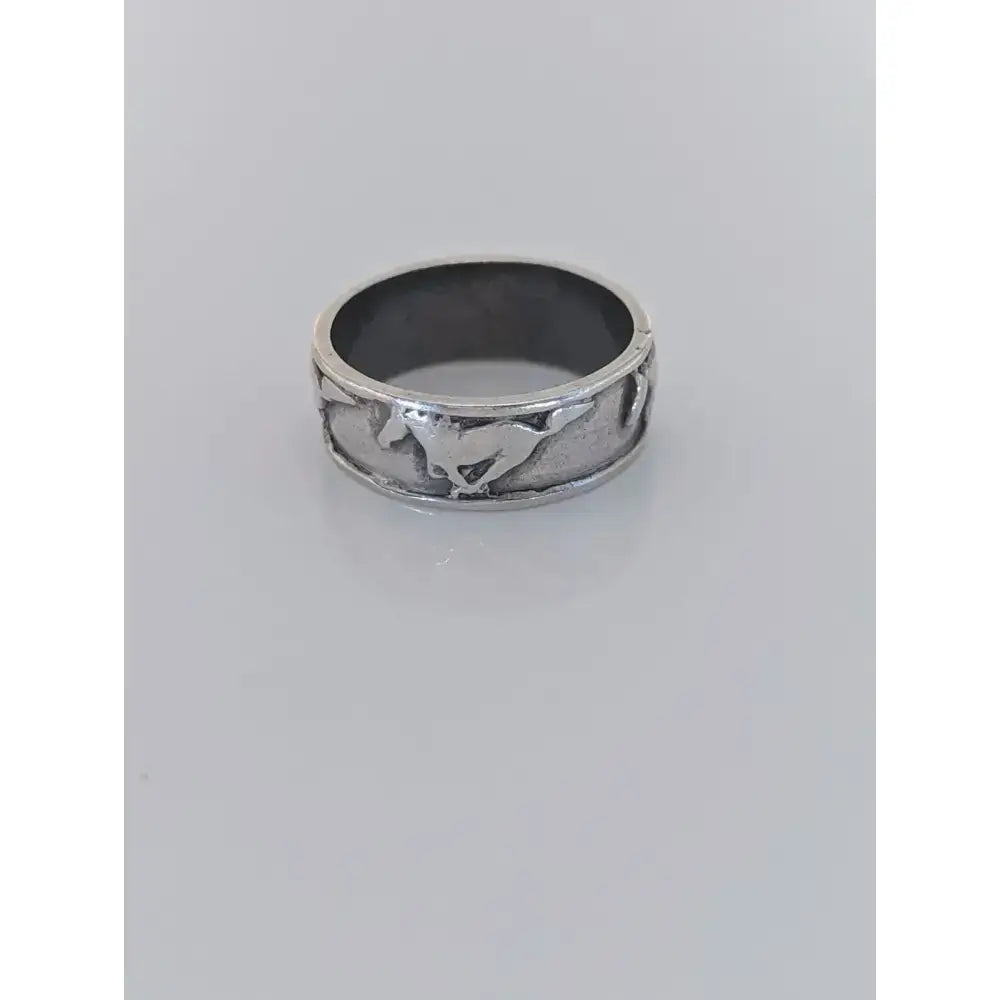 Silver galloping horses band featuring a raised horse silhouette in sterling silver for him or her