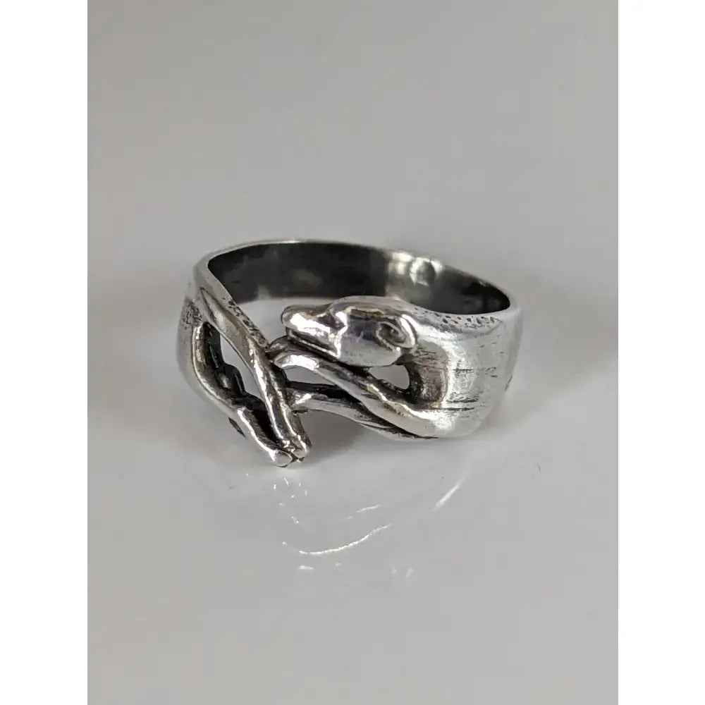 Silver greyhound ring featuring a handmade elegant dog lovers band with a coiled snake design in sterling silver