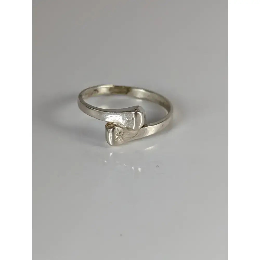 Silver hoof nail ring with textured twisted band and engraved motif perfect equestrian gift for him and her