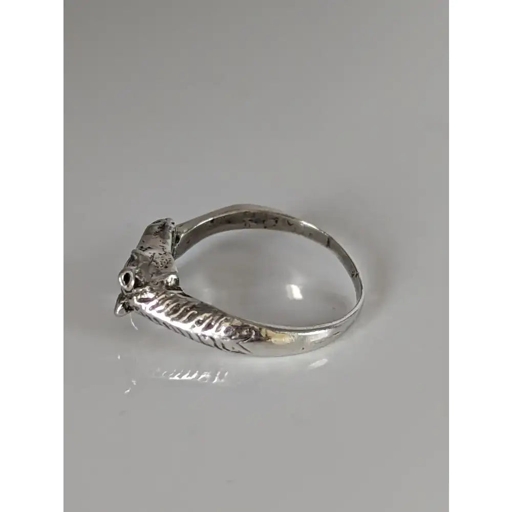 Silver fish shaped ring with detailed scales and textured body perfect as a silver horse head hoof ring equestrian gift