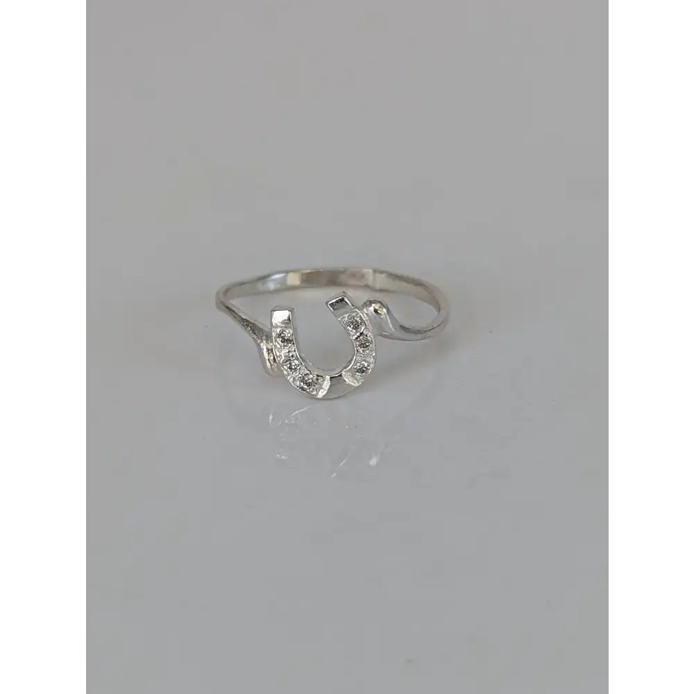Delicate 925 silver horseshoe ring with sparkling cubic zirconia stones perfect as a lucky equestrian gift