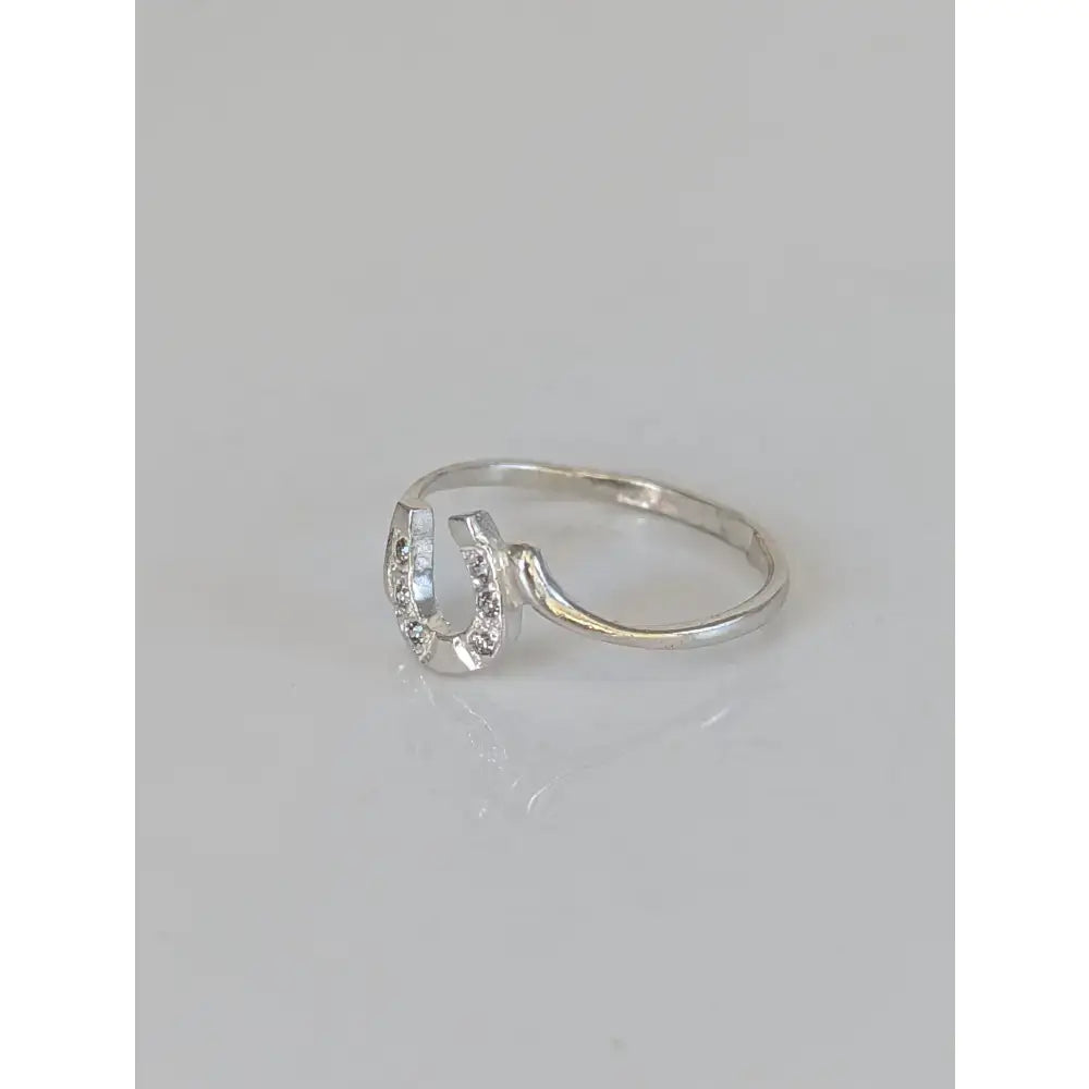Silver horseshoe ring made of 925 silver with clear cubic zirconia stones perfect as a lucky equestrian gift