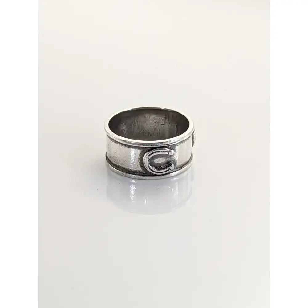 Silver horseshoes band handmade equestrian ring in 925 silver with bold raised letter c design on the band