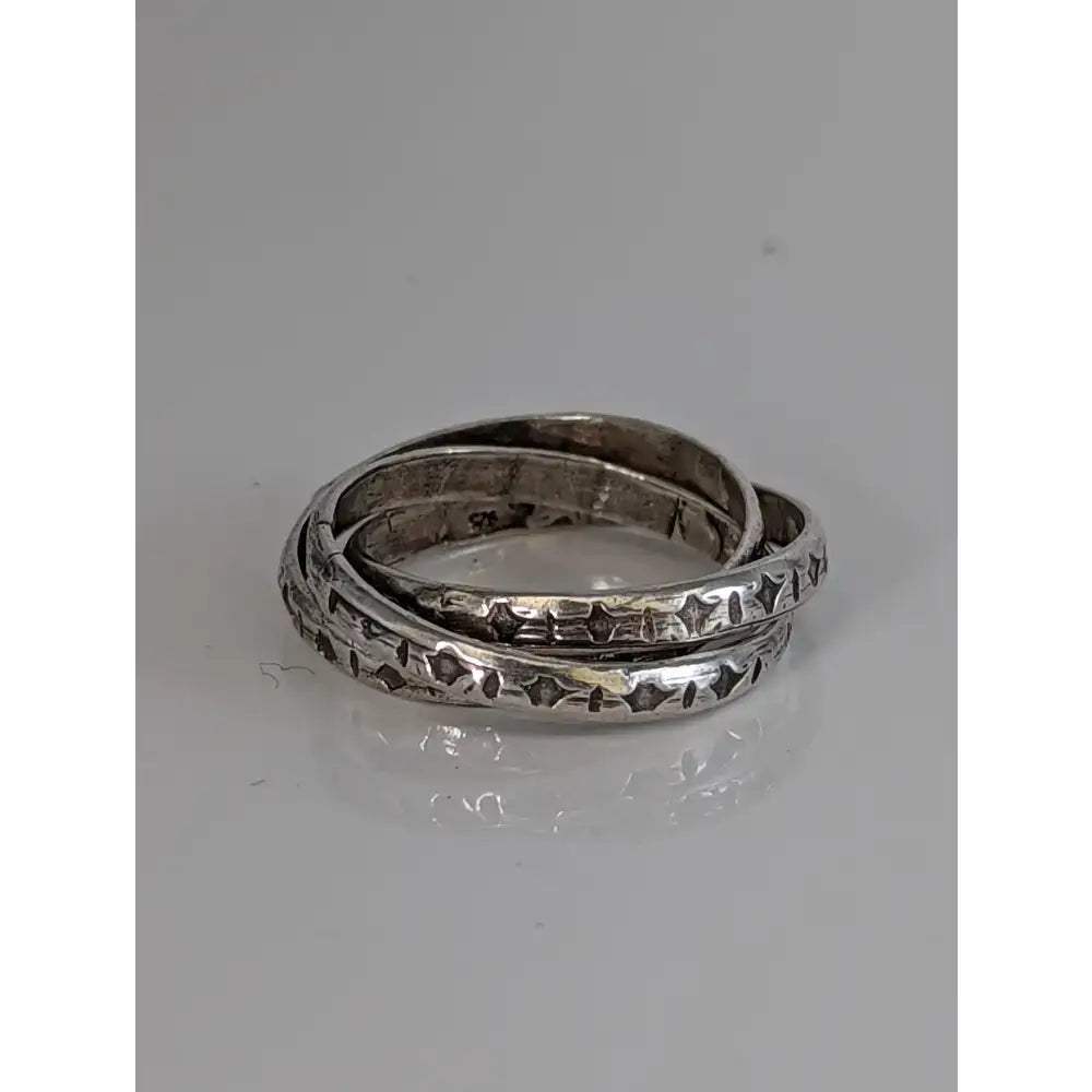 Silver interlinking bands ring in sterling silver with textured star pattern handmade equestrian jewellery by silver steed