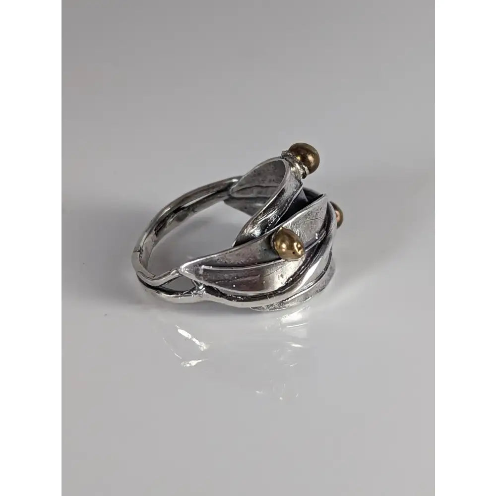 Silver leaves ring with brass buds artisan design featuring a 925 silver band inspired by nature