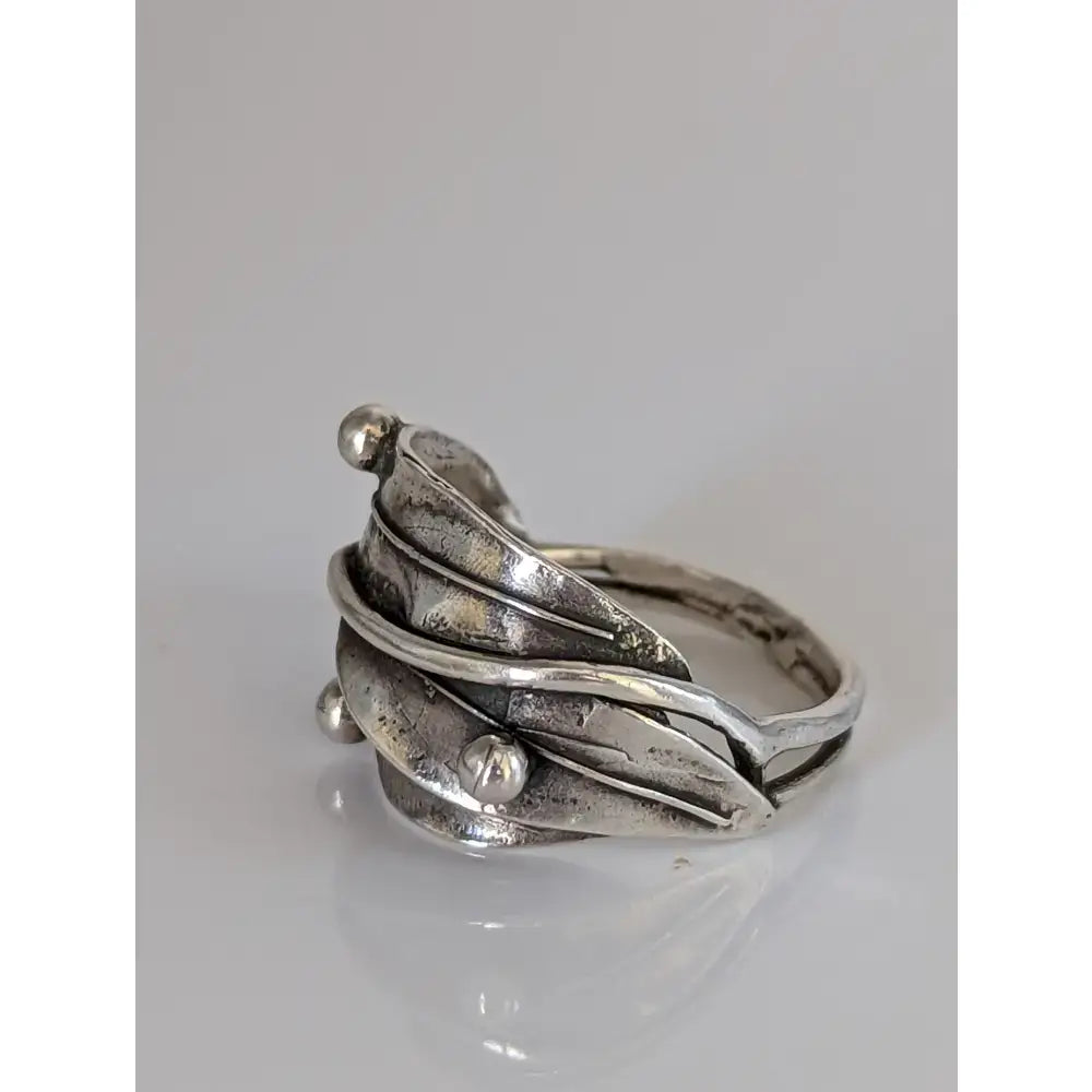 Silver leaves ring with textured layered design and silver buds made of 925 silver for nature-inspired gift