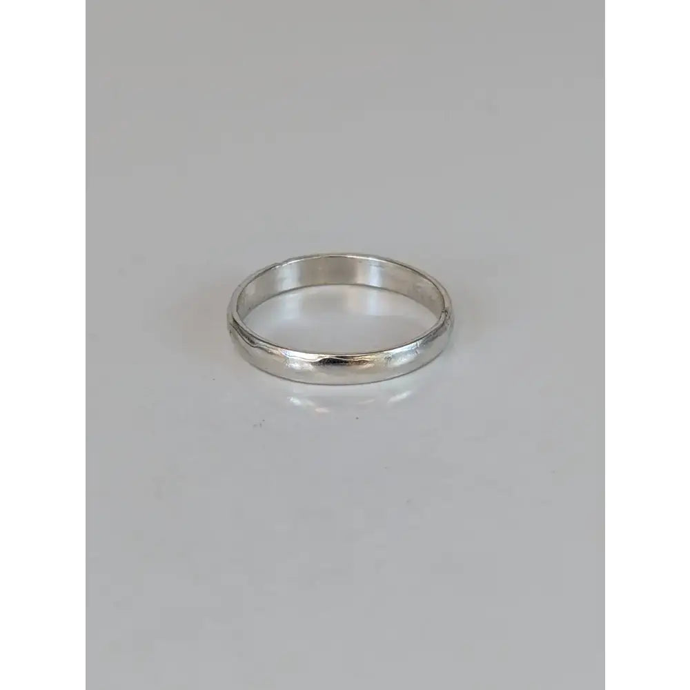 A sleek 925 silver plain band ring with a smooth texture, perfect minimalist band ring and equestrian ring unisex