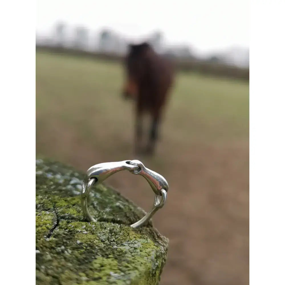 Silver snaffle bit ring with sleek flat band design and polished finish handmade equestrian gift for him or her