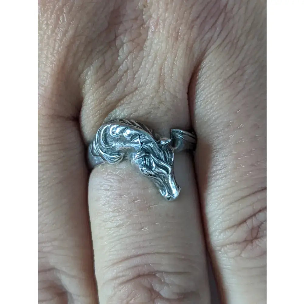 Silver steed horse head ring with intricate detailing and polished finish for a bold equestrian statement