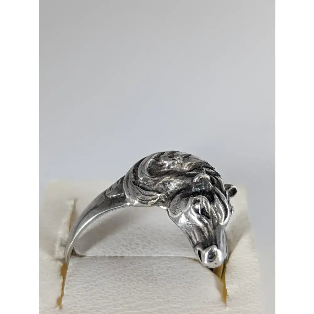 Silver steed horse head ring featuring a bold equestrian statement with intricate flowing mane design in 925 silver