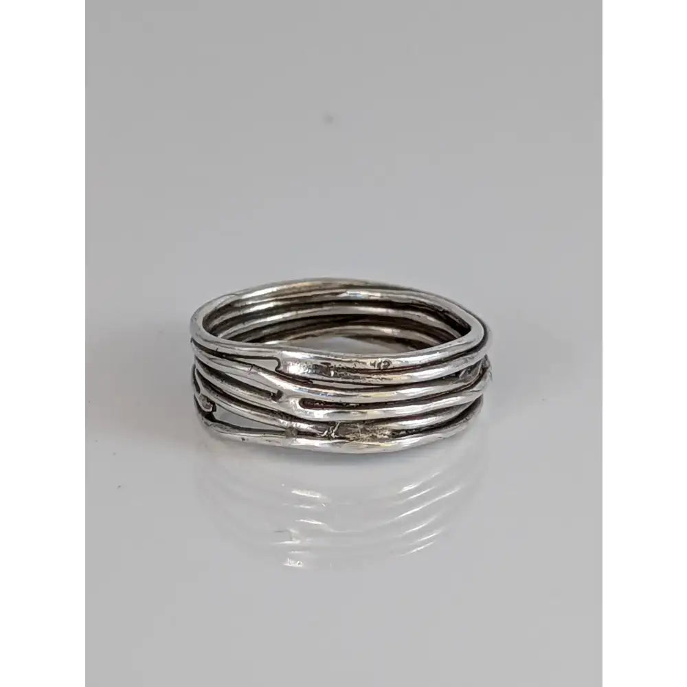 Silver wired band handmade ring featuring textured intertwined bands in 925 silver for modern minimalism style