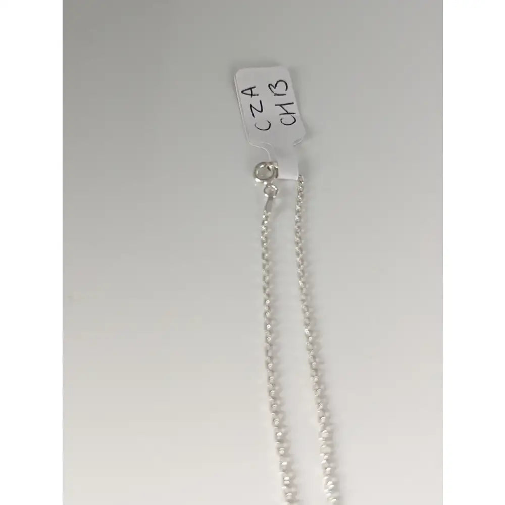 Silver ball chain necklace in sterling silver with a small clasp and tag from timeless jewellery small artisan batches