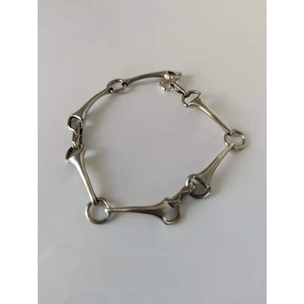 Silver sterling silver snaffle bit bracelet with polished links and secure clasp handmade equestrian jewelry