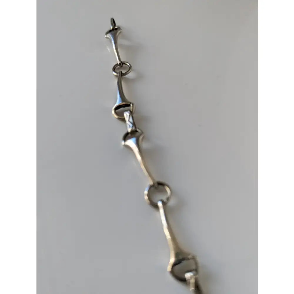 Silver sterling silver snaffle bit bracelet with polished links handmade equestrian jewelry with minimalist design