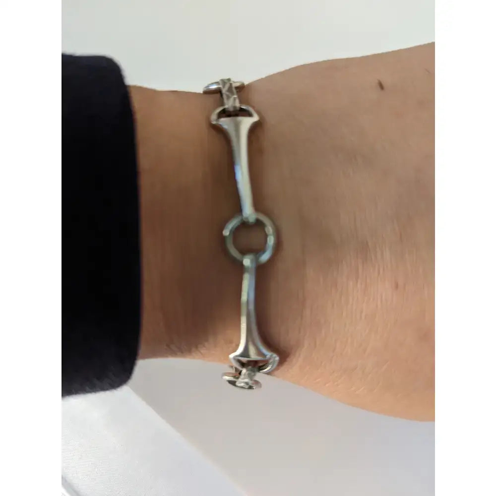 Silver sterling silver snaffle bit bracelet with polished finish and interlocking links handmade equestrian jewelry