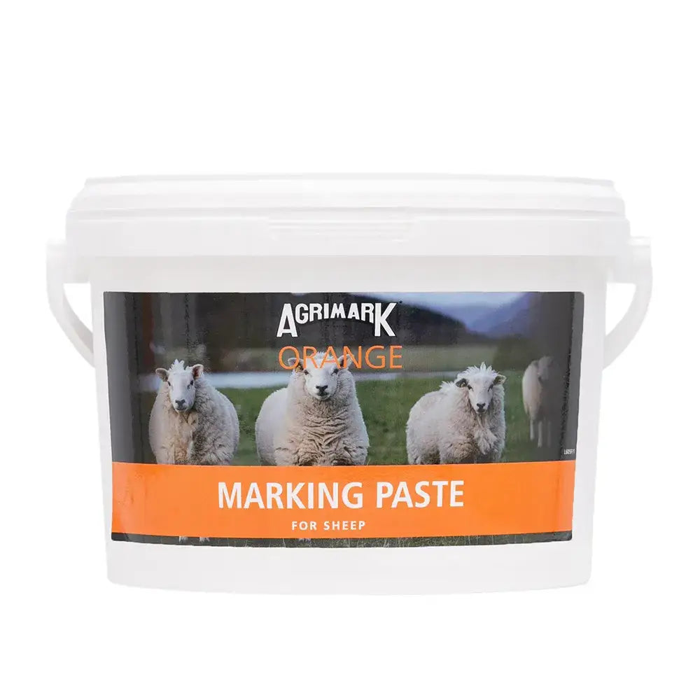 White plastic bucket of agrimark marking paste with orange label for durable, highly visible marking on sheep