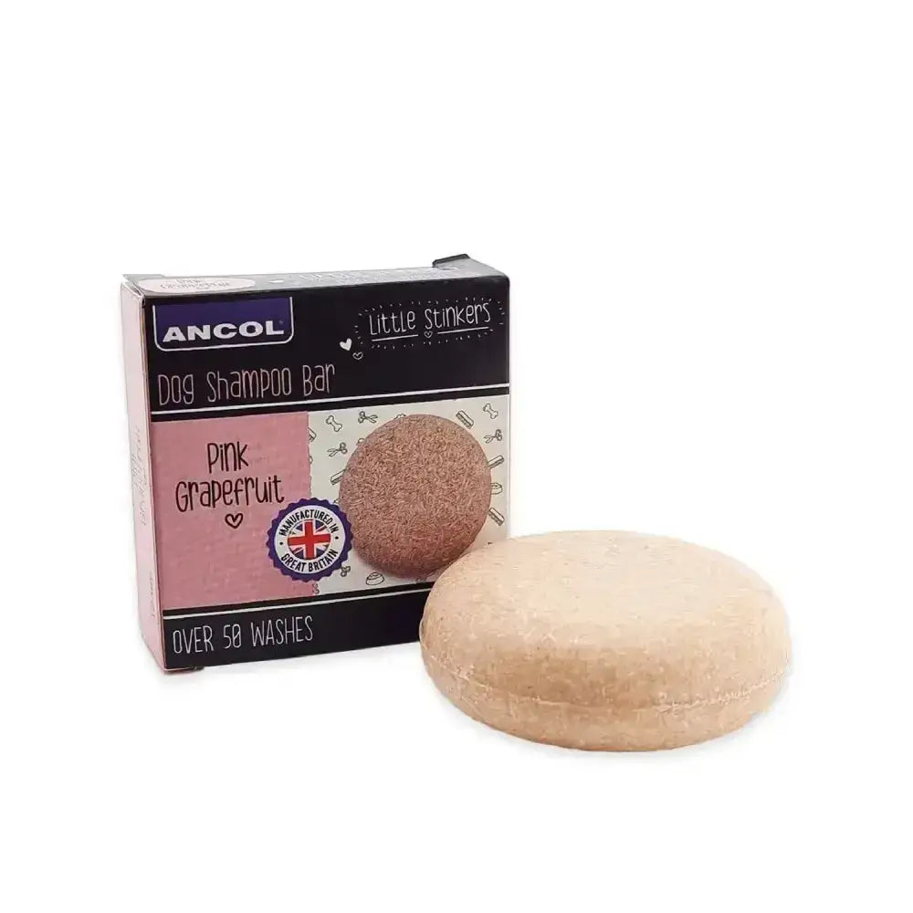 Pink grapefruit scented ancol little stinkers dog shampoo bar with a textured beige surface for stinkers dog shampoo care