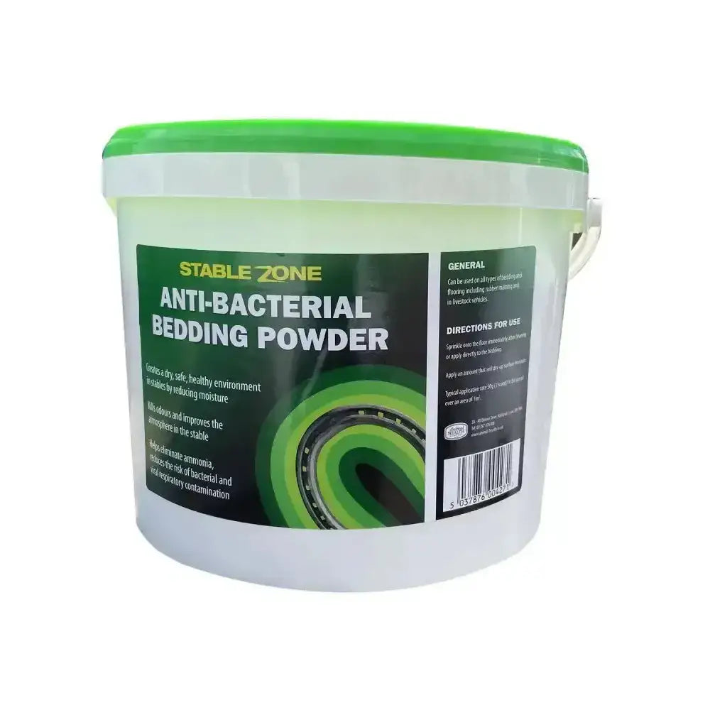 Animal health company stablezone antibacterial bedding powder in white bucket with bright green lid for clean stable use