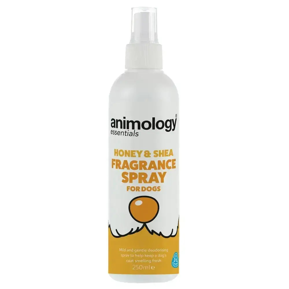 White plastic spray bottle with orange and black labeling featuring a cartoon dog face for animology essentials honey shea fragrance spray