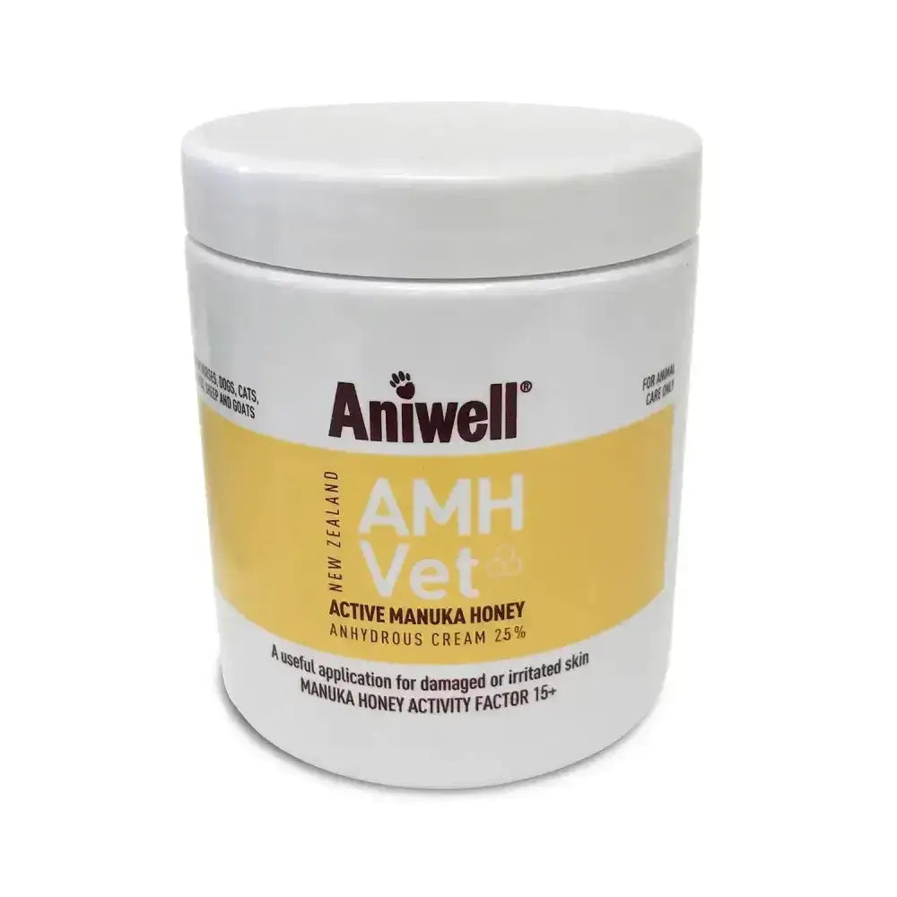 White cylindrical jar of aniwell amh vet cream with active manuka honey 25 percent and yellow label with white lid