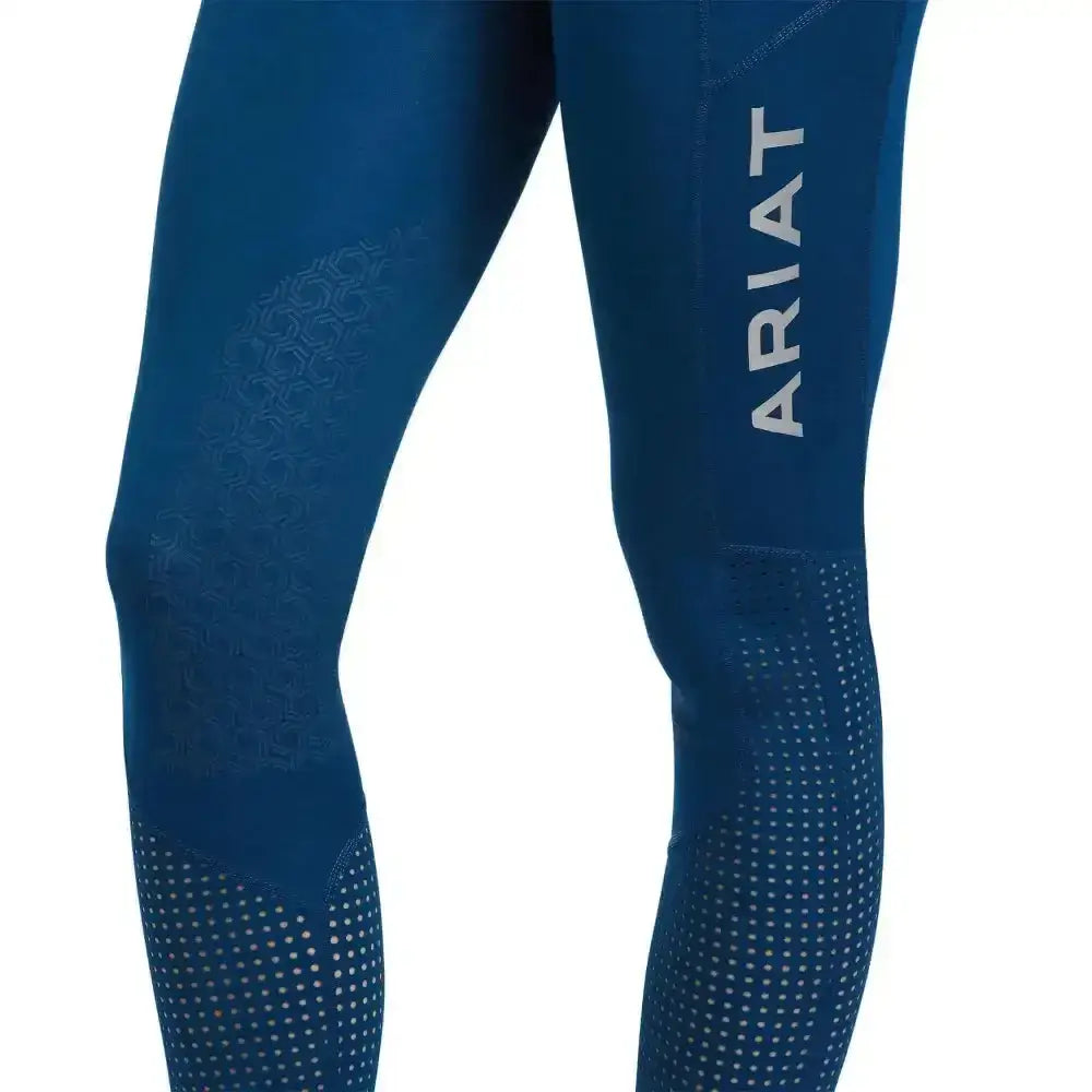 Deep blue ariat ladies eos knee patch riding tights with white perforated detail and textured thigh pattern