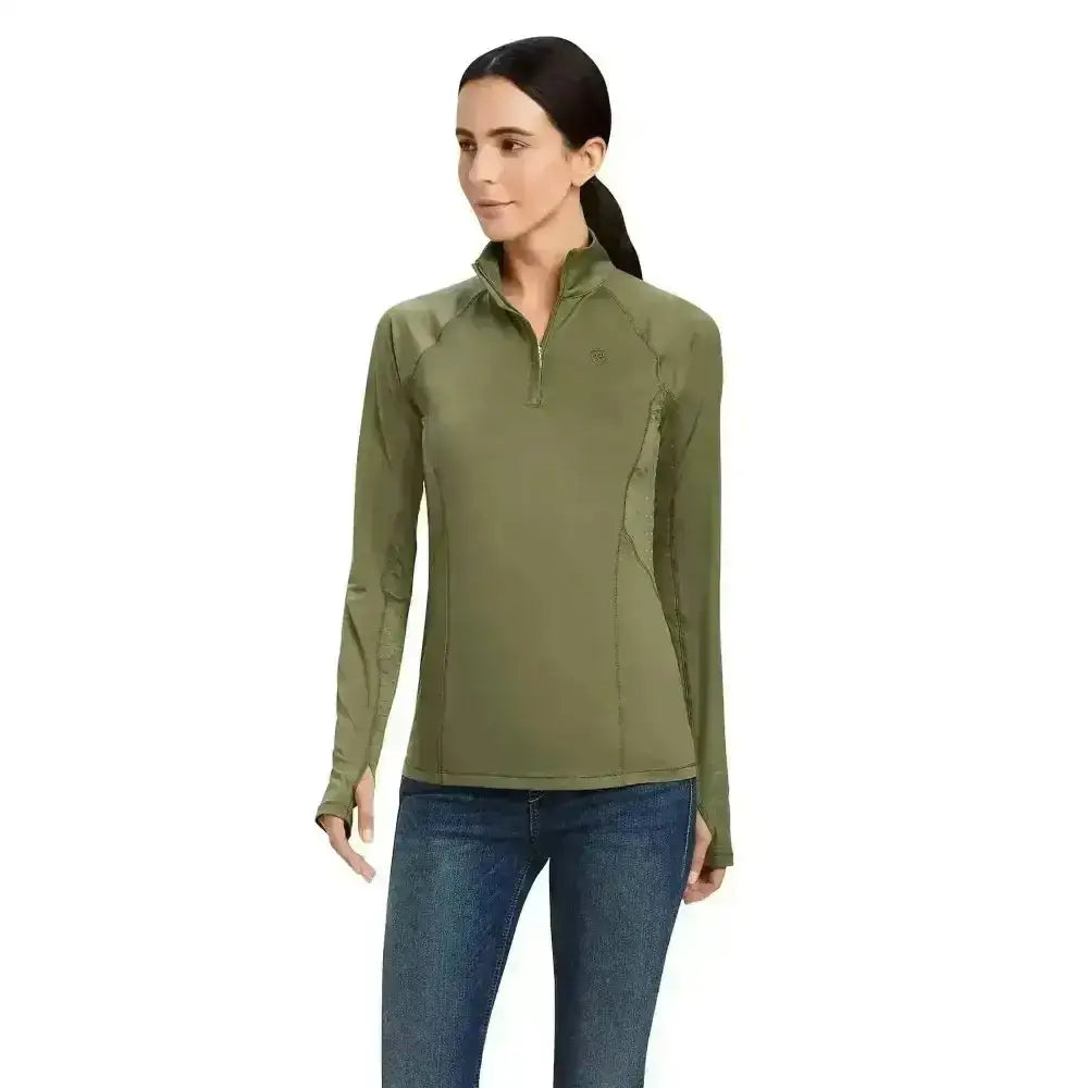 Olive green long-sleeved athletic top with quarter-zip collar and subtle seams from the ariat lowell base layer 2.0