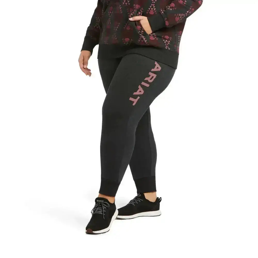 Black ariat jogger sweat pants with pink lettering down the side from real ariat jogger collection