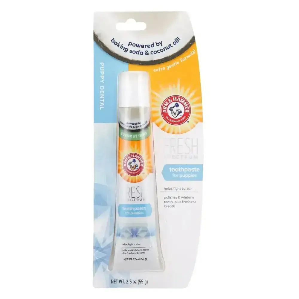 Arm & hammer fresh coconut mint toothpaste for puppies in a clear tube with orange and blue labeling featuring coconut oil