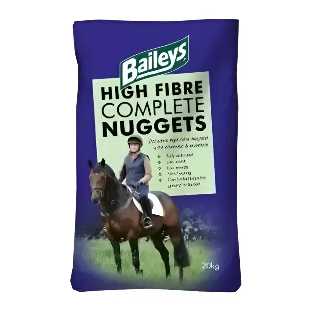 Baileys high fibre complete nuggets horse feed in a 20kg purple bag with a rider on a brown horse image
