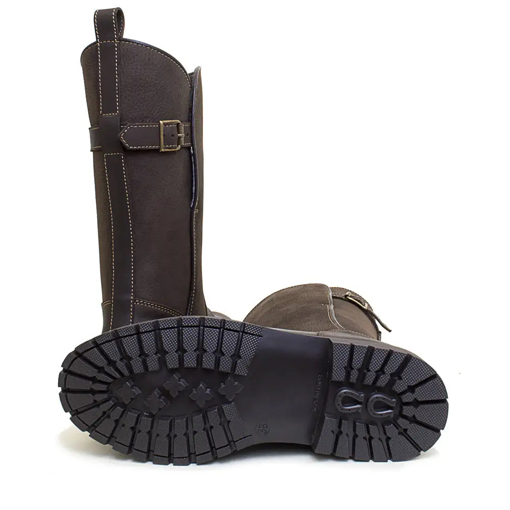 Dark brown leather knee-high bareback footwear quebec waterproof boots with stormproof wil-tex and silver buckles