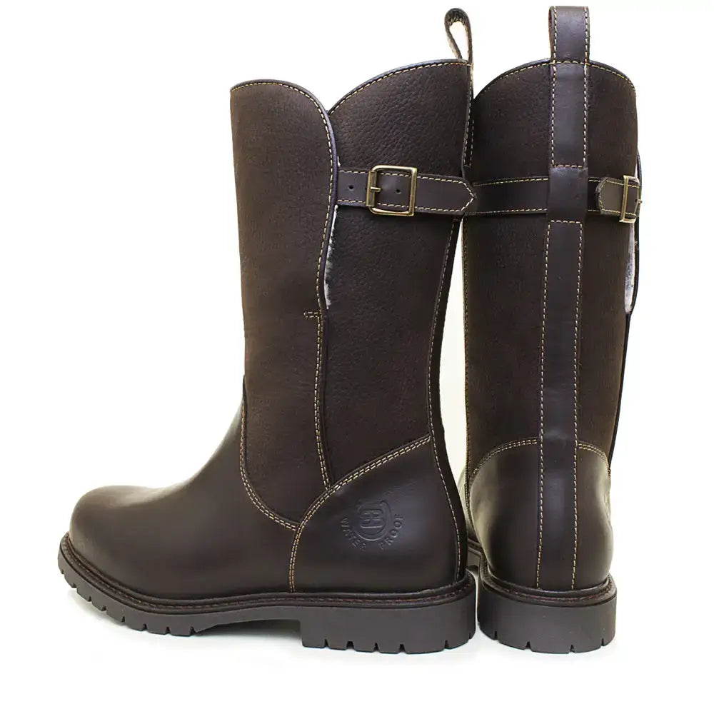 Dark brown leather fur lined boots with textured sole and light stitching from bareback footwear quebec waterproof zip-up line