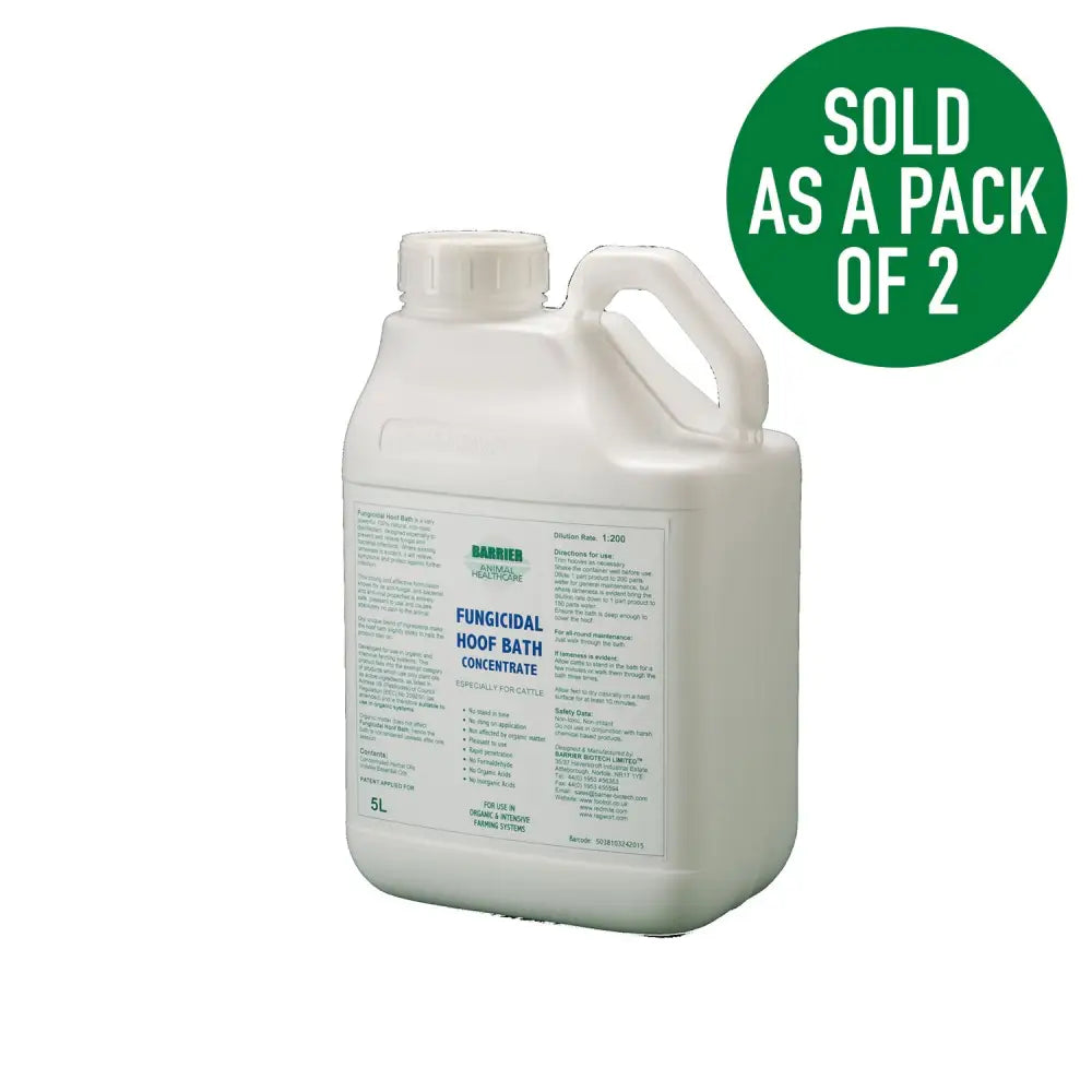 White plastic jug with handle and cap labeled fungicidal hoof bath concentrate by barrier animal health for cattle care