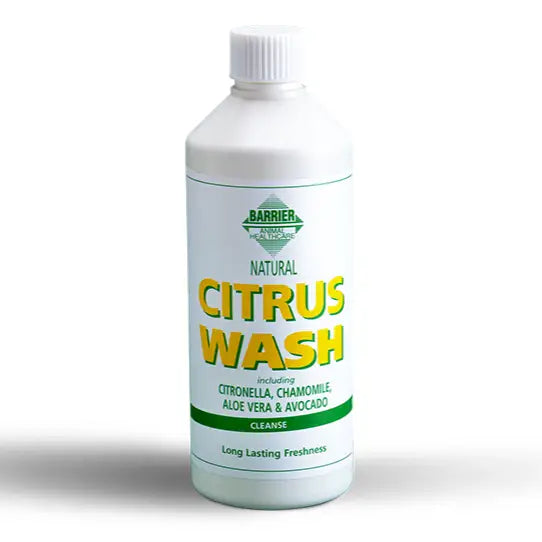 White plastic bottle of barrier citrus wash with green yellow label listing pure concentrated citronella and aloe vera ingredients