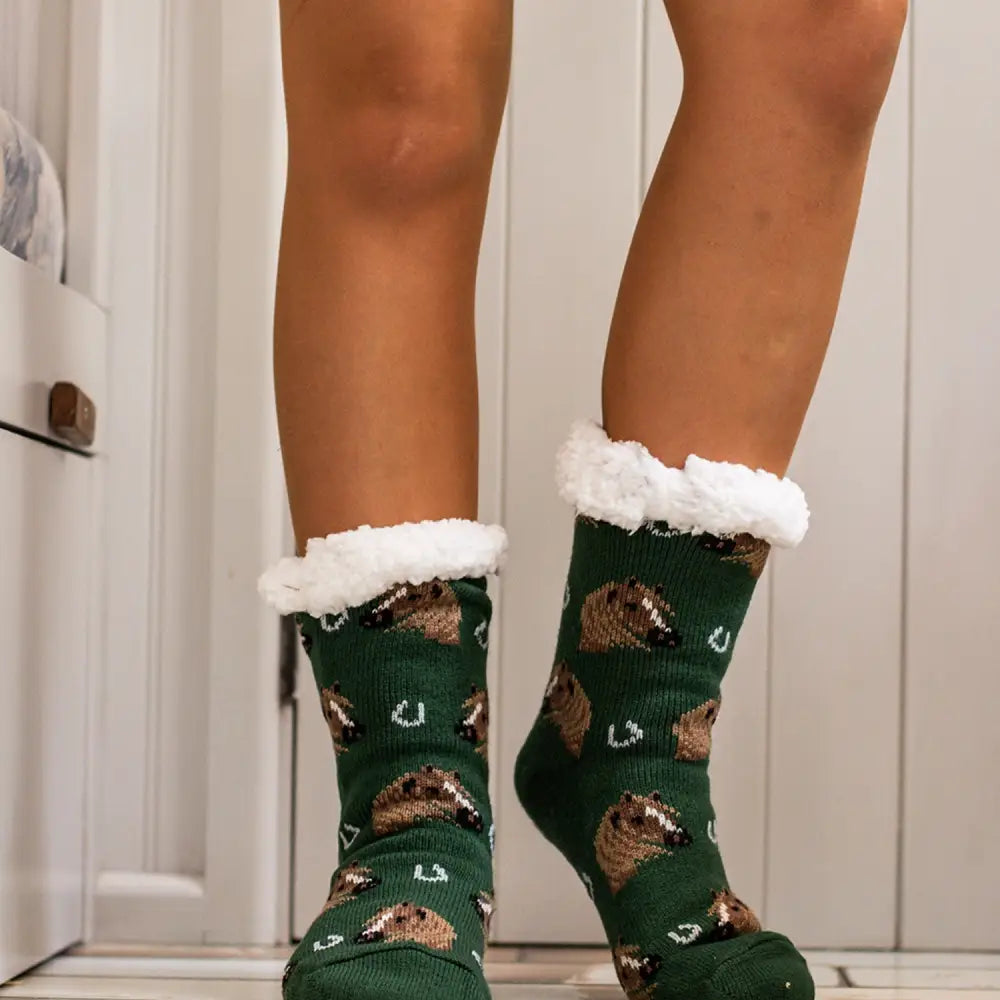 Green knit funky sherpa socks ladies with brown and white hedgehogs and plush white fleece cuffs