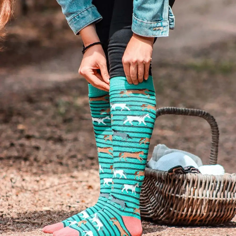 Teal and white striped funky welly socks ladies galloping horse with playful dog breed pattern knee-high design