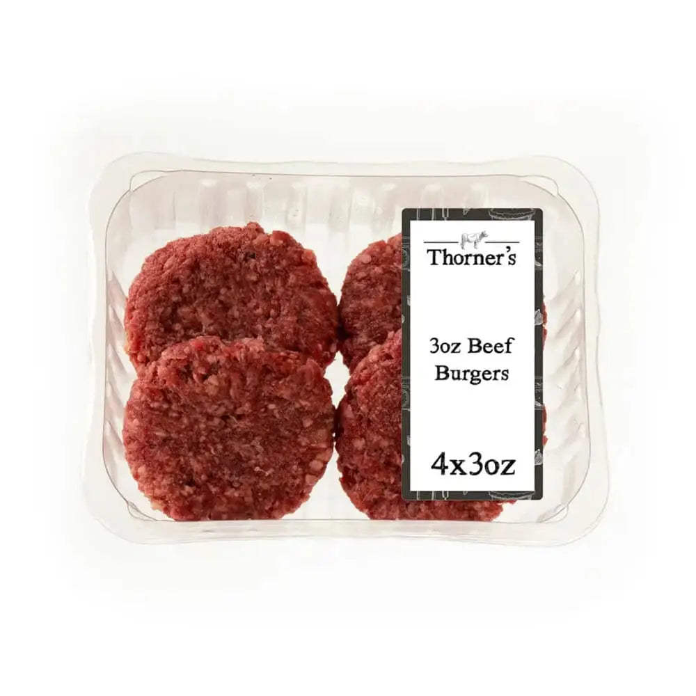 Clear plastic container holding four round red thorners 3oz beef burgers labeled high-quality meat beef burgers 3oz