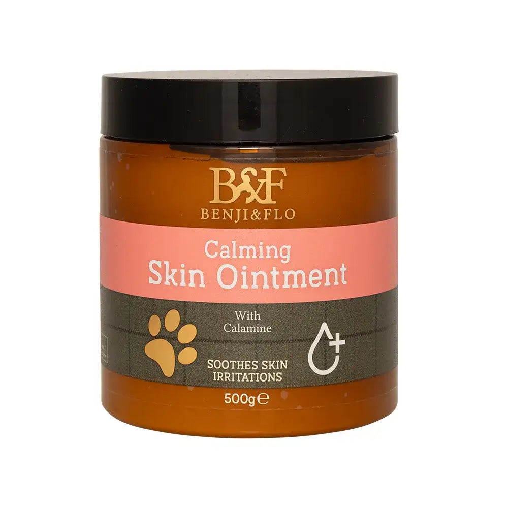Benji and flo calming skin ointment in amber glass jar with black lid and pink paw print label for skin relief