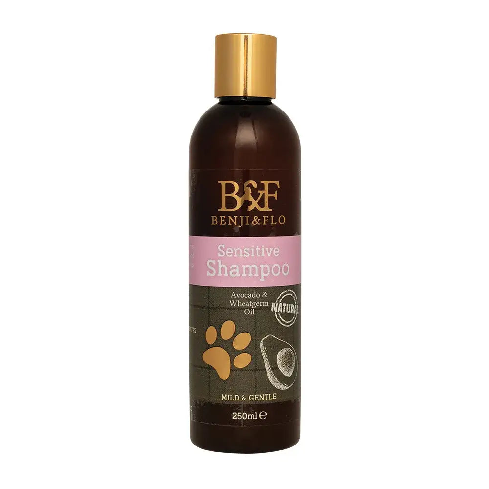 Benji and flo sensitive shampoo in a dark brown bottle with gold cap featuring avocado and wheatgerm oil for sensitive scalp
