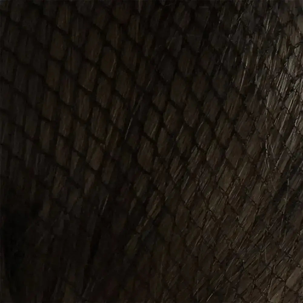 Dark brown woven texture of bitz hairnets showing standard weight and heavyweight hairnets material close up