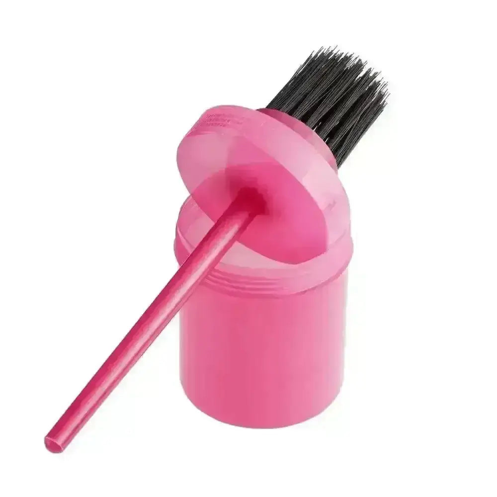 Pink plastic hoof oil brush with black bristles and matching handle from bitz hoof oil brush set