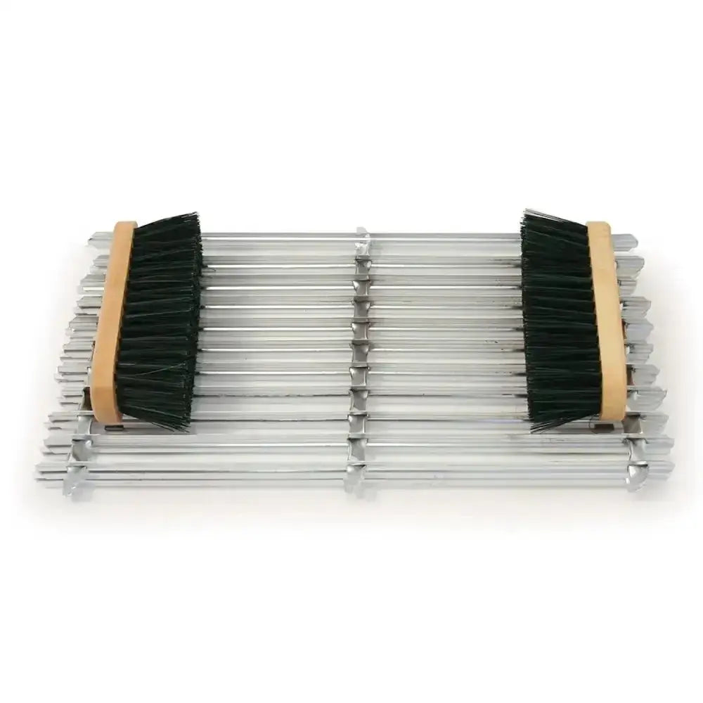 Set of stainless steel wrenches with black bristle brushes on wooden handles for boot scraper mat to remove mud