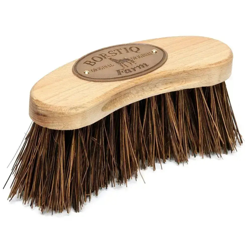 Light wooden borstiq banana dandy brush with dense dark brown natural bristles and brass plaque borstio original farm