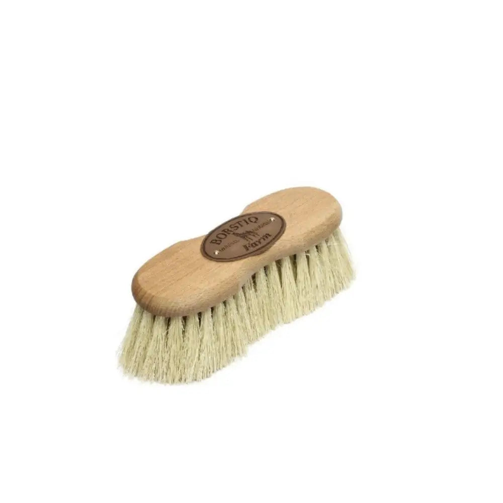 A borstiq shaped mex fibre brush with light wooden handle and natural mexican fibre bristles featuring a branded plaque