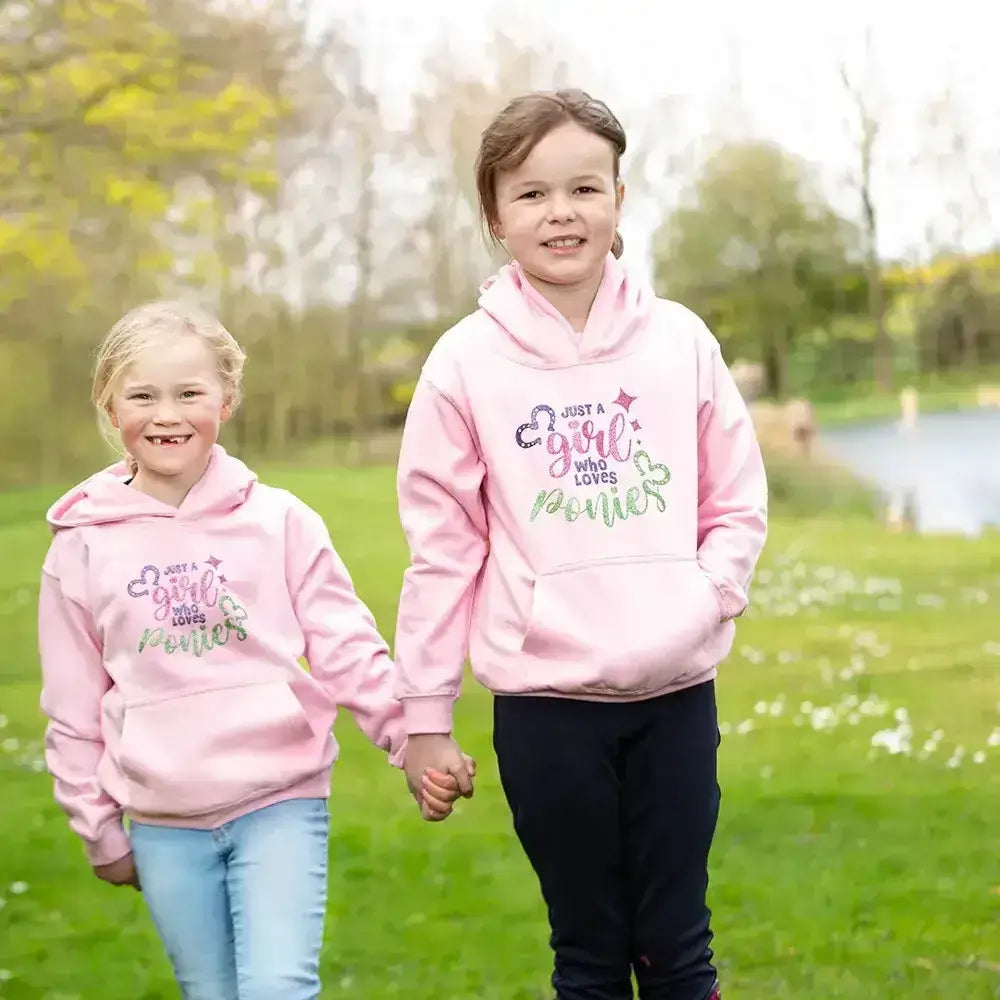 Pink hooded sweatshirt from british country collection with glittery loves ponies slogan and heart details perfect for pony fans