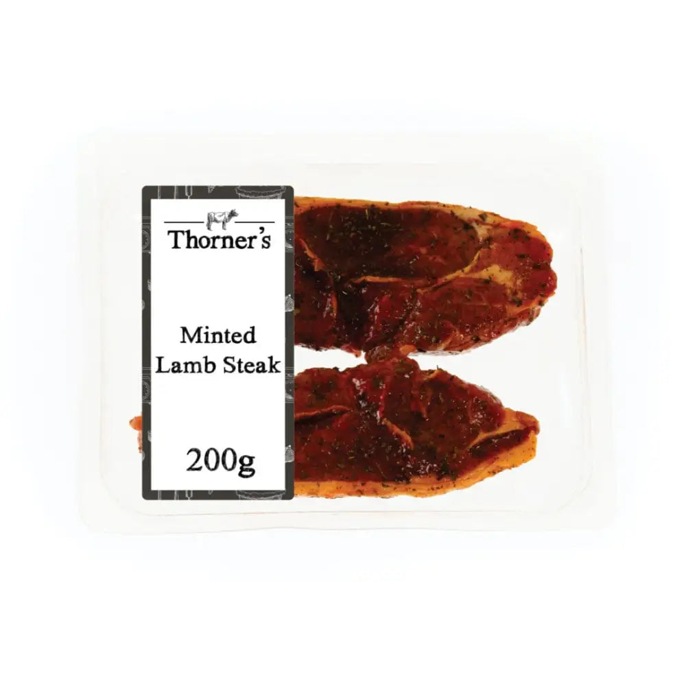 Thorners british lamb minted steaks in clear pack showing two marinated cuts with herbs perfect for high-quality meat fans