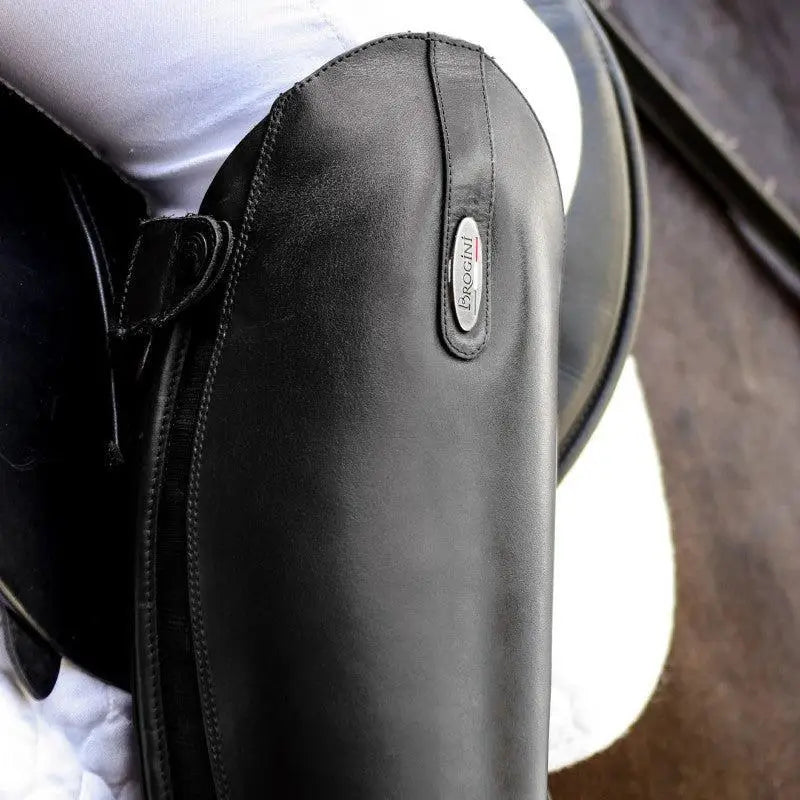 Black leather brogini turin pro competition boot with silver brocchi brand tag for dress riding