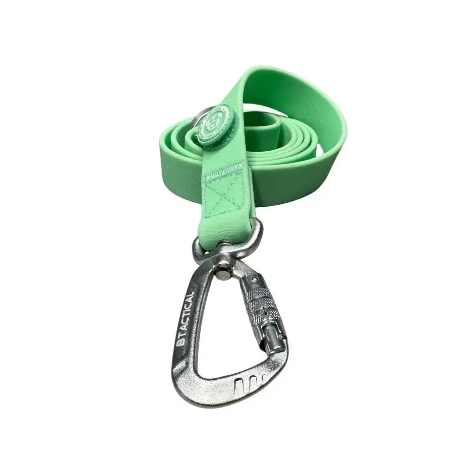 A pastel green btactical lead made of mint green silicone with a silver carabiner clip dog for extra strength
