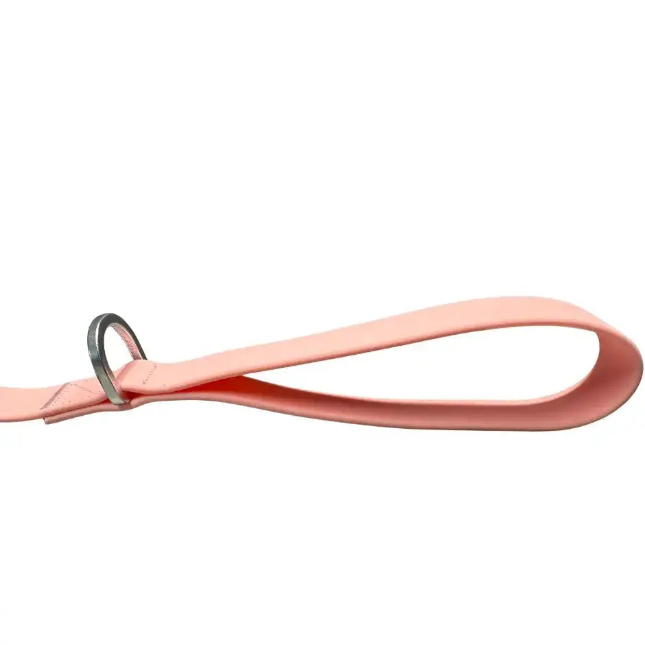 A pastel pink btactical™ pvc dog lead with sleek leather alternative and extra-strong anti-tangle swivel buckle
