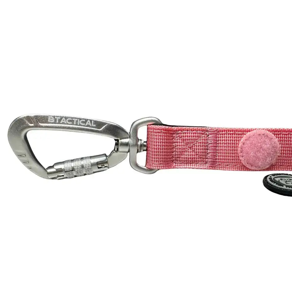 Pink woven nylon dog lead with extra-strong carabiner clip and soft pink felt button for anti-tangle use